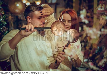 Comfortable. Smiling Family, Caucasian Couple Looking For Home Decoration And Holidays Gifts In Hous
