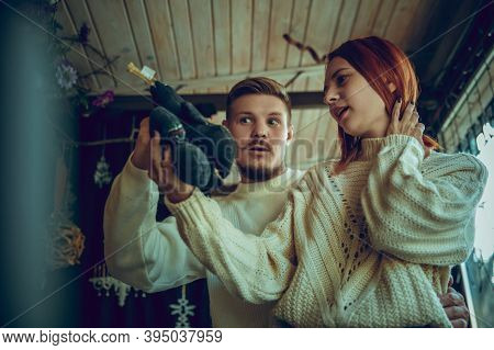 Handmade. Smiling Family, Caucasian Couple Looking For Home Decoration And Holidays Gifts In Househo