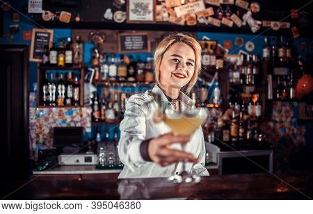 Girl Bartender Makes A Cocktail In The Pothouse