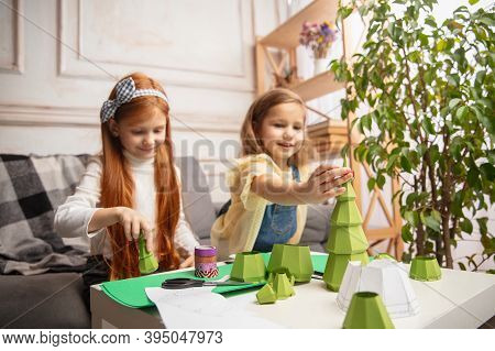 Art. Two Little Children, Girls Together In Creativity Of The House. Happy Kids Make Handmade Toys F