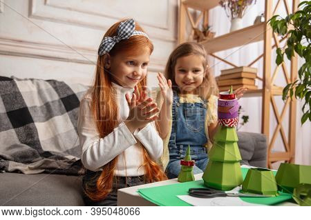 Christmas Tree. Two Little Children, Girls Together In Creativity. Happy Kids Make Handmade Toys For