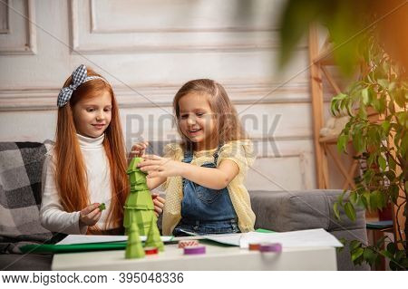 Cheerful. Two Little Children, Girls Together In Creativity Of The House. Happy Kids Make Handmade T