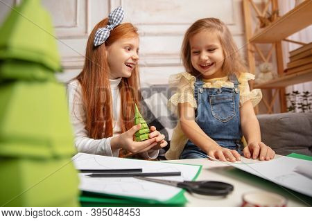 Gift. Two Little Children, Girls Together In Creativity Of The House. Happy Kids Make Handmade Toys 