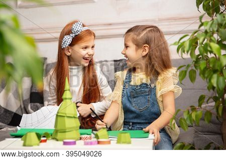 Happiness. Two Little Children, Girls Together In Creativity Of The House. Happy Kids Make Handmade 
