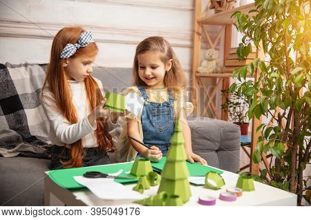 Happiness. Two Little Children, Girls Together In Creativity Of The House. Happy Kids Make Handmade 