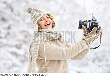 Spend Day Outdoors. Girl With Vintage Camera In Snowy Nature. Holidays Concept. Capturing Winter. Ta