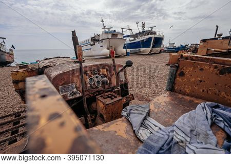 Hastings Port, East Sussex / Uk -  2020.08.08: Bulldozers At Hastings Fishing Boats On The Beach At 