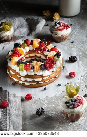 Round Pie With Berries On A Gray Background
