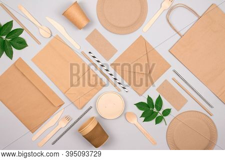 Flat Lay Composition With Eco-friendly Tableware - Kraft Paper Food Packaging On Light Grey Backgrou