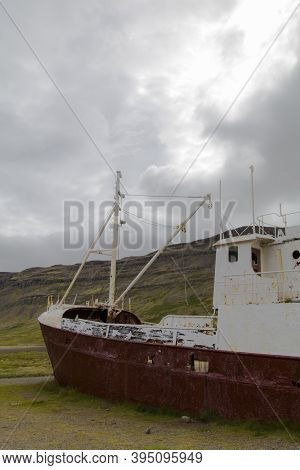 An Out-of-the-way Whaling Ship That Rusts On The Road To Látrabjarg On A Dead Cloudy Day. The Shipwr