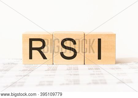 Word Rsi. Wooden Small Cubes With Letters Isolated On White Background With Copy Space Available.bus