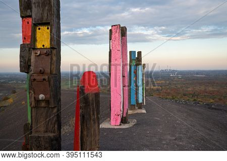 Bottrop, Germany - December 31, 2020: Totems On Haniel Tip, Landmark Of Ruhr Metropolis Against Rain