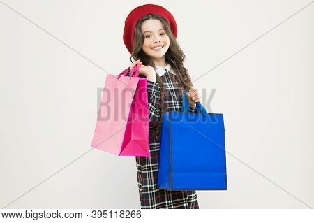 Big Sales. Happy Girl With Long Curly Hair In Beret. Shopping. Child With Shopping Bag. Parisian Chi