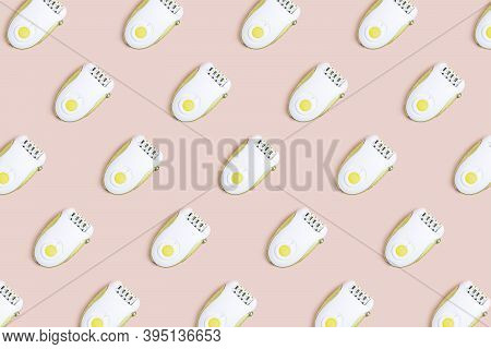 Patternt Form Epilator On A Beige Background. Self-care In A Modern Presentation With Natural Colors