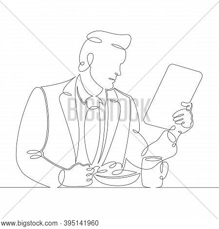 A Man In A Suit Businessman At Breakfast Meal Reads The News In The Tablet. One Continuous Drawing L