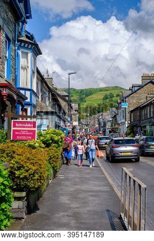 AMBLESIDE, UK - AUGUST 9,2019 : The colorful village of Ambleside on the picturesque Lake District in England