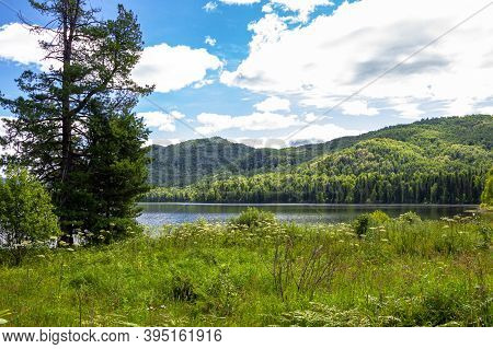 Clouds On Lake Tagasuk. Siberia, Krasnoyarsk Region, Russia
