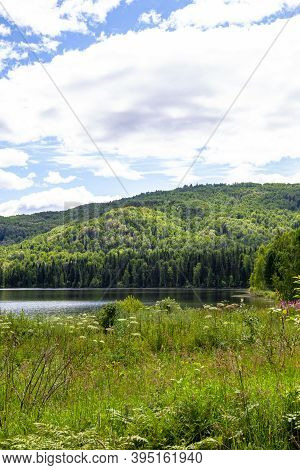 Cloudy Landscape At Lake Tagasuk. Krasnoyarsk Territory, Siberia, Russia