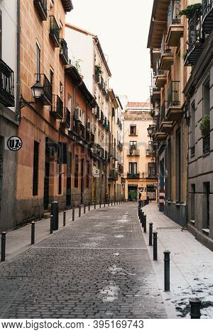 Madrid, Spain - October 2, 2020: Typical Street Amidst Old Residential Buildings In The Neighborhood