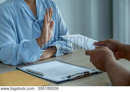 Government Officials Refused To Accept Bribes From The Businessmen Offer For Signing In A Contract O