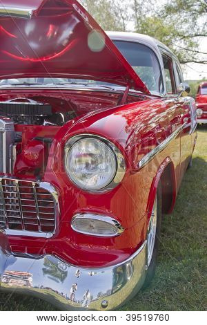 1955 Chevy Bel Air rojo & blanco vista lateral