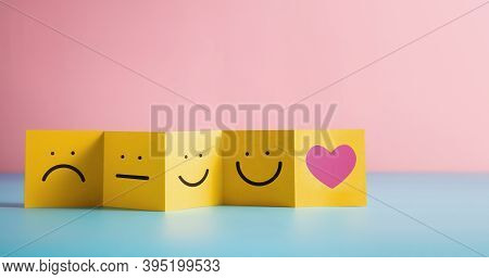Customer Experiences Concept. Feedback Symbol On Fold Paper From Negative To Positive Review. Poor T