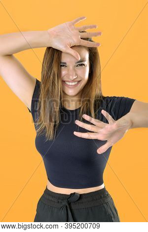 Young Woman With Nice And Very Beautiful Appearance, Making Funny Expression