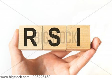 Word Rsi. Wooden Small Cubes With Letters Isolated On White Background With Copy Space Available.bus