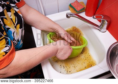Female Hands Washing Chicken Pickled Meat Running Water In The Kitchen At Home