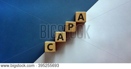 Concept Words 'capa, Corrective And Preventive Actions' On Wooden Cubes On A Beautiful White And Blu