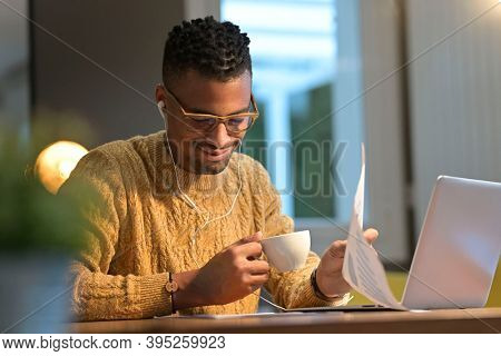 Portrait of african american trendy guy in a distant online call