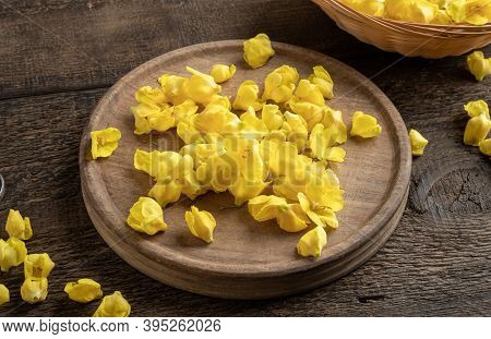 Denseflower Mullein Flowers On A Wooden Table