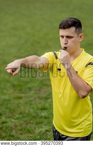 Referee Showing On Penalty While Gaming. Concept Of Sport, Rules Violation, Controversial Issues, Ob