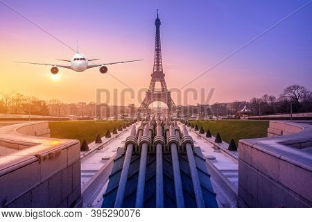 Real Airplane Over The Cityscpae With The View Of Eiffel Tower Paris, France