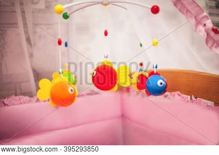 Childrens Musical Mobile Carousel. Toys Above The Crib In The Form Of Fish. Device For The Best Slee