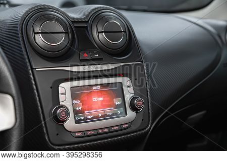 Novosibirsk, Russia - November 16, 2020: Alfa Romeo Mito, Auto Interior, Car Stereo Audio System Fro