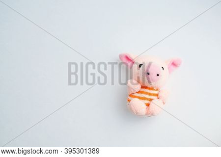 Soft Toy Pink Pig On A Light Background