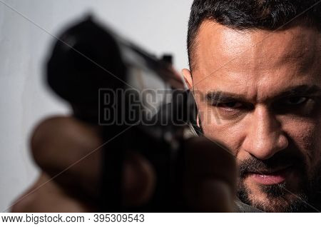 Need For Revenge. Close Up Gun Barrel. Killer Or Murderer Concept. Head Hunting. Man Handsome Mafia 