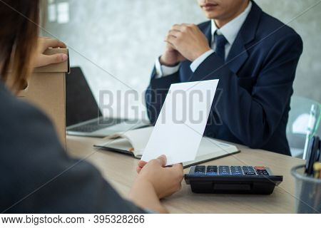 Female Employee Had A Brown Cardboard Box Beside Her And Sent Resignation Letter To The Executive. H