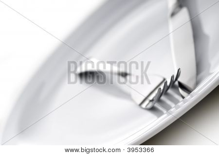 Shallow Focus Silverware On A Plate
