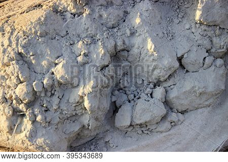 Background Of Solidified Sand And Cement Waste. Dry Mix