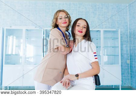 Medicine And Healthcare Concept. Young Surgeons Trainees In A Surgical Office.
