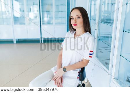Female Doctor Surgeon Working At Surgery Room And Smiling At Camera.