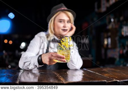 Sweet Girl Bartending Intensely Finishes His Creation At The Night Club