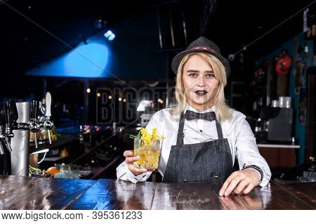 Girl Bartender Makes A Cocktail In The Pothouse