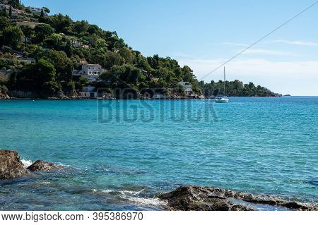 Summer Vacation On French Riviera, Crystal Clear Azure Blue Water Of  Mediterranean Sea On Beach In 