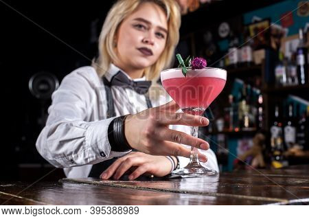 Girl Bartender Mixes A Cocktail On The Taproom