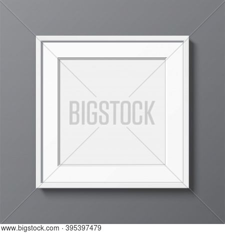 Square White Frame With Passepartout Hanging On A Grey Wall. Blank Elegant Frame Template, With Clea