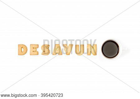 Desayuno With Alphabet Letters Cookies And A Cup Of Coffee On A White Background In A Top View (brea