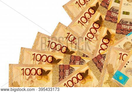 1000 Kazakhstani Tenge Bills Lies In Different Order Isolated On White. Local Banking Or Money Makin